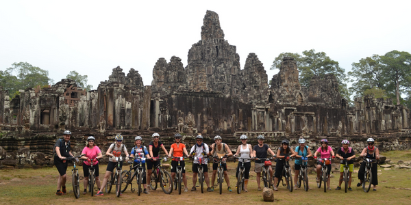 Cyclists outside of Angkor Wat, Cambodia